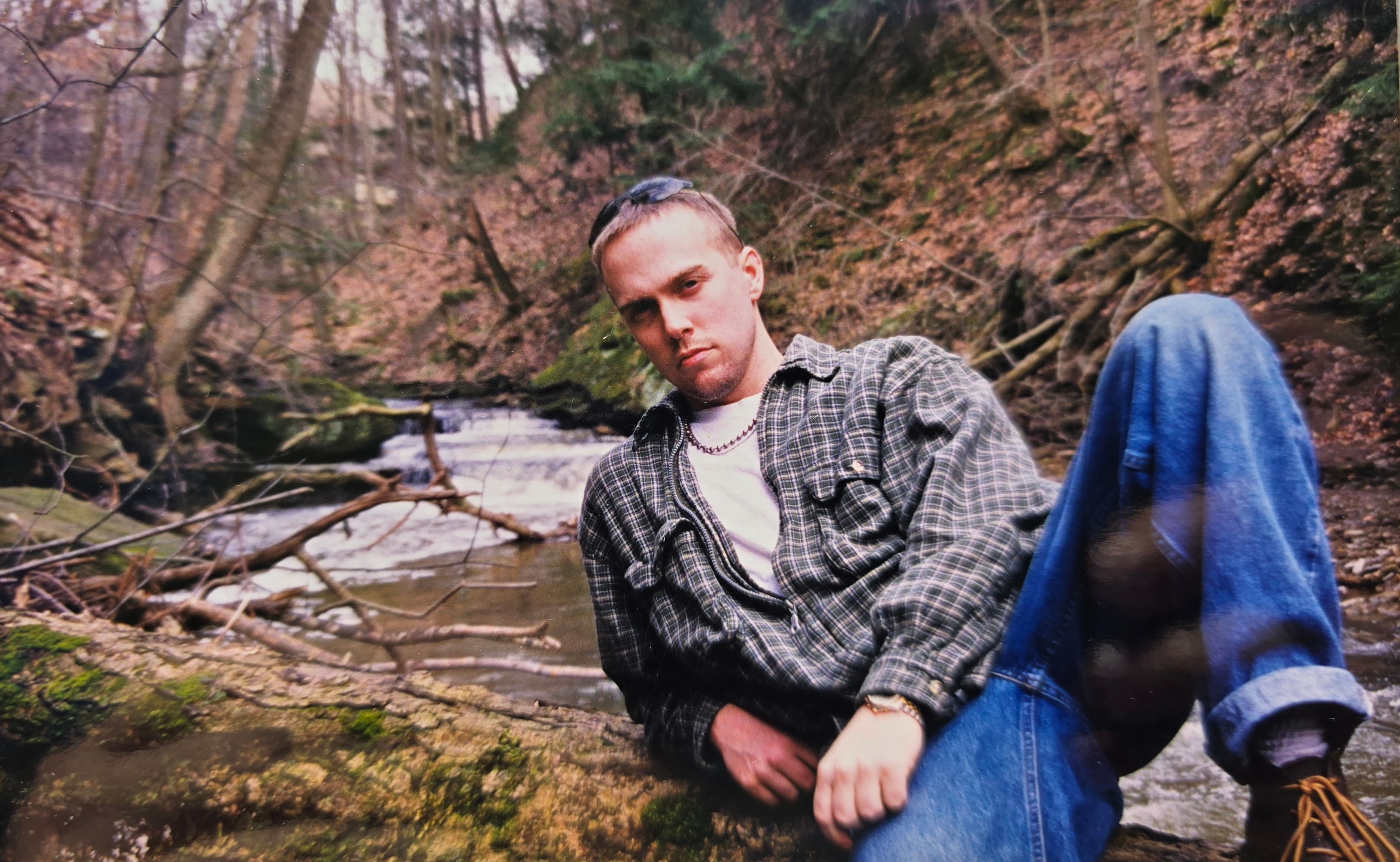 Kene Bell in a wooded creek environment in Akron