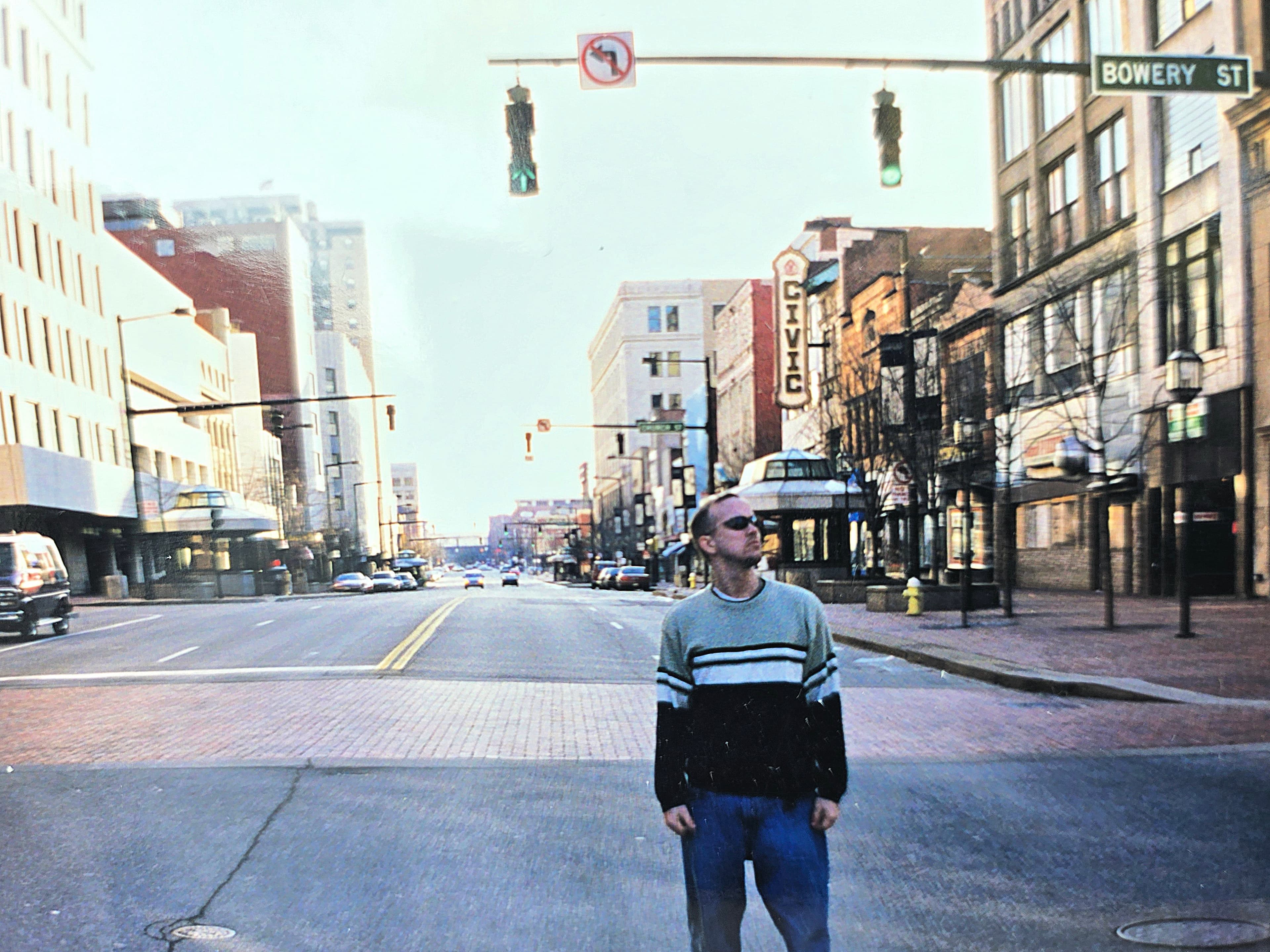 Kene Bell on Bowery Street with the Akron Civic Theatre in the background