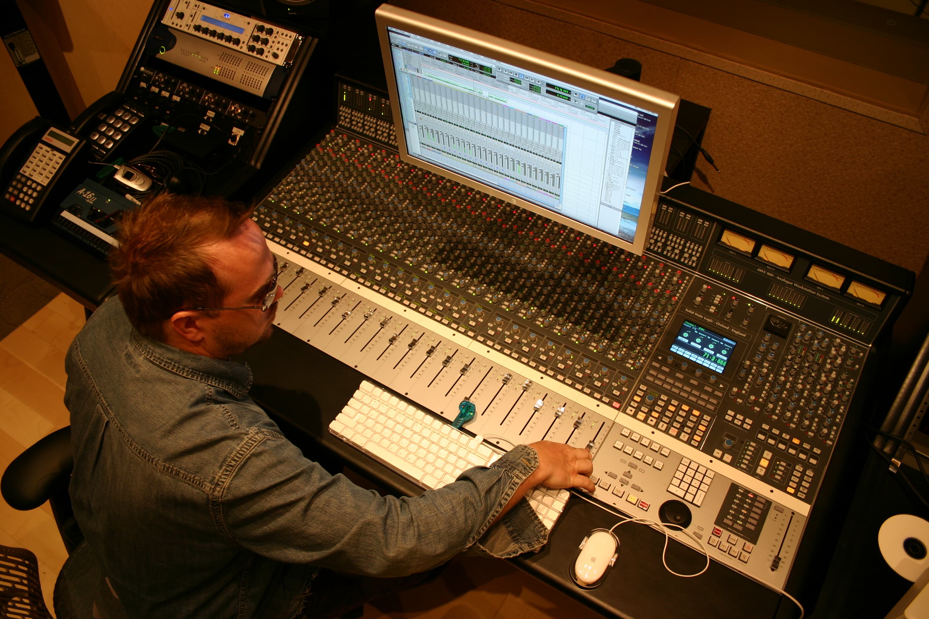 Kene Bell working at a recording console during the Arizona studio period