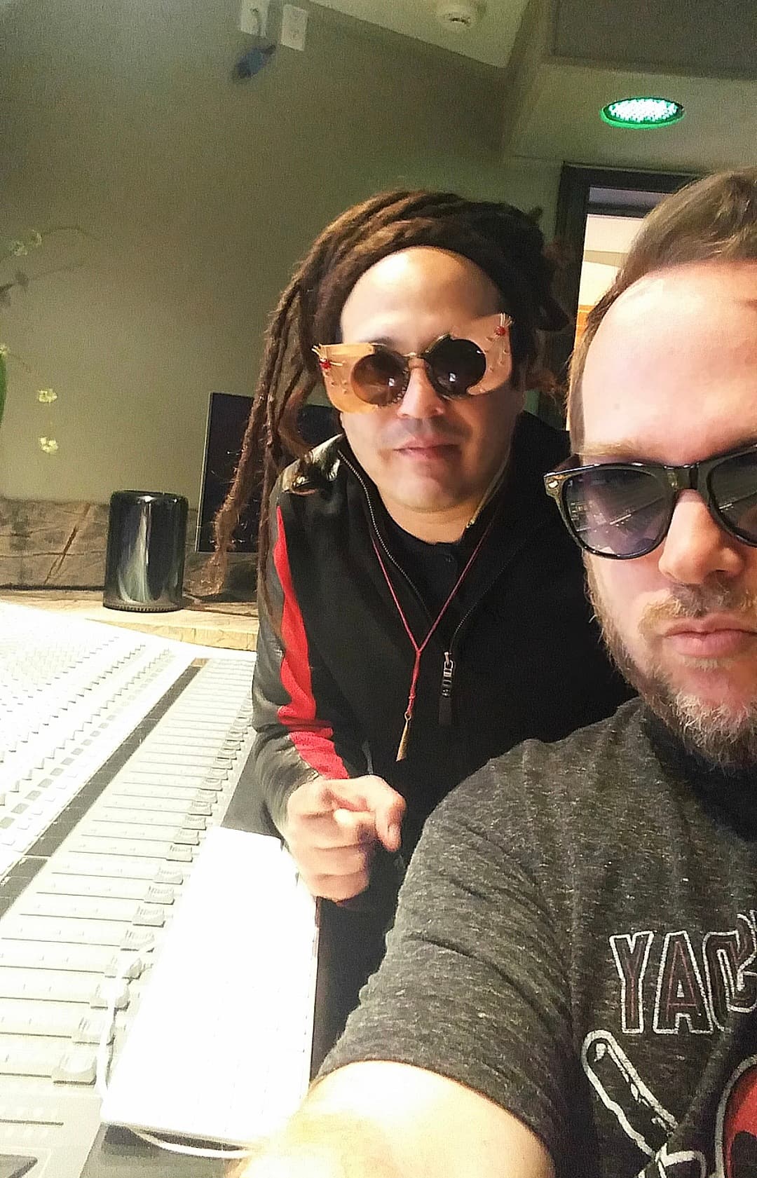 Kene Bell and Ivan Gutierrez together beside a recording console