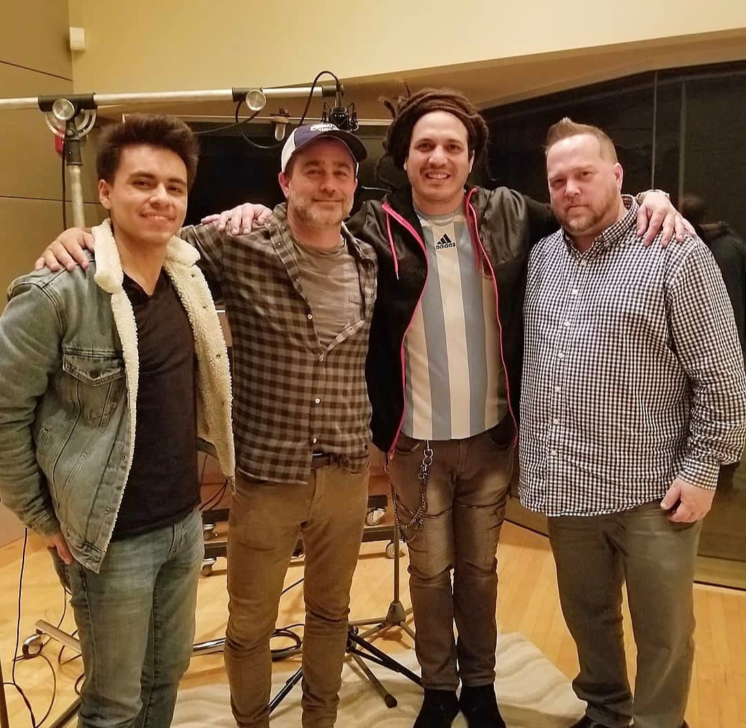 Kene Bell and Ivan Gutierrez with two collaborators in a recording studio