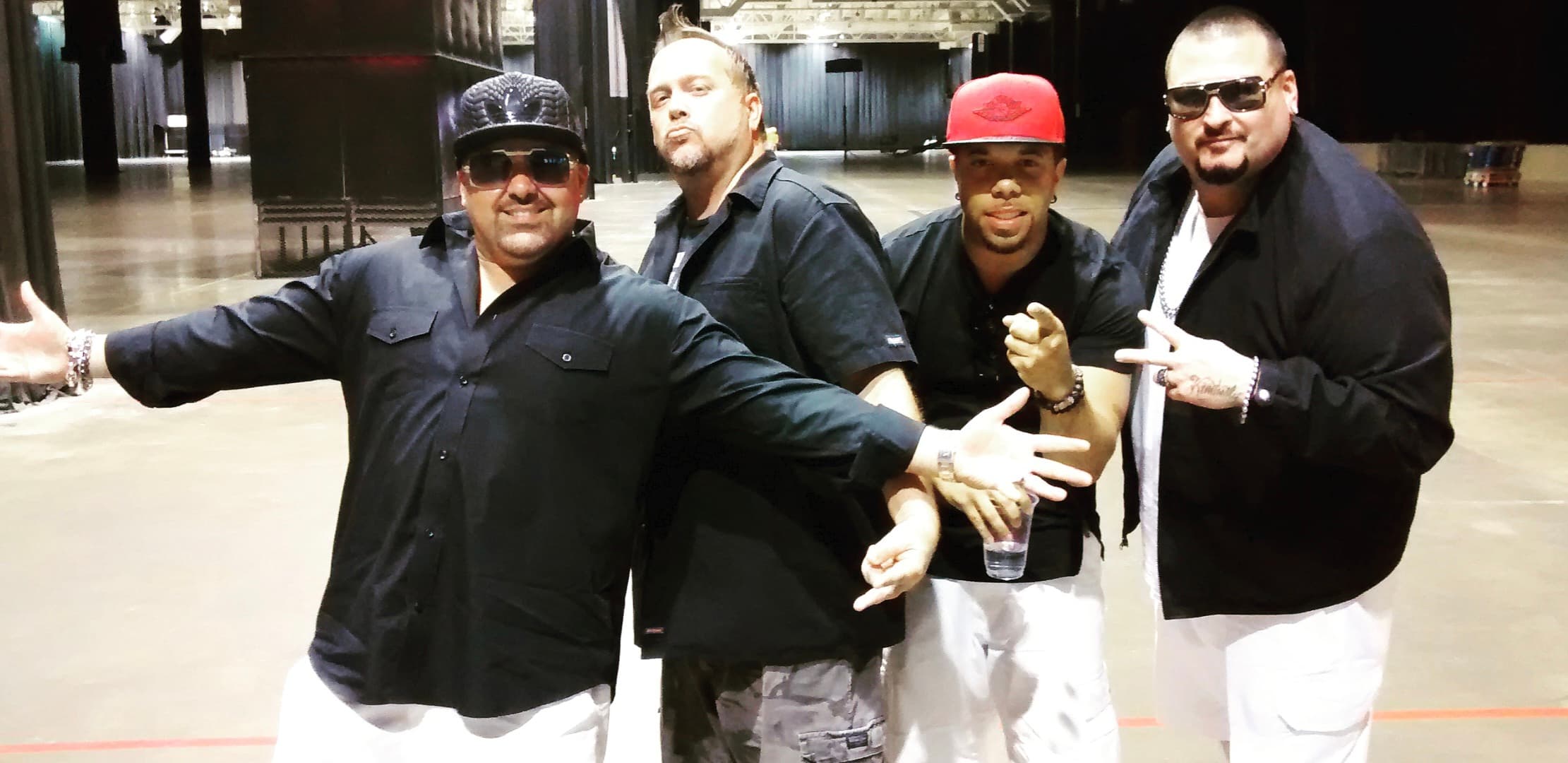Kene Bell with Color Me Badd inside a large venue