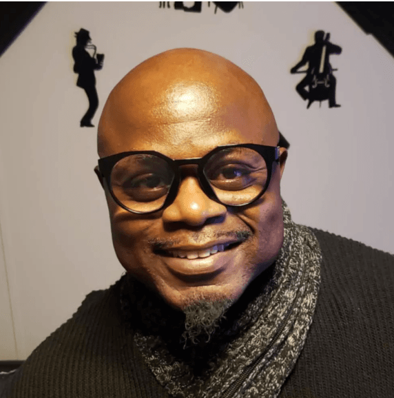 Alton Lee wearing glasses
