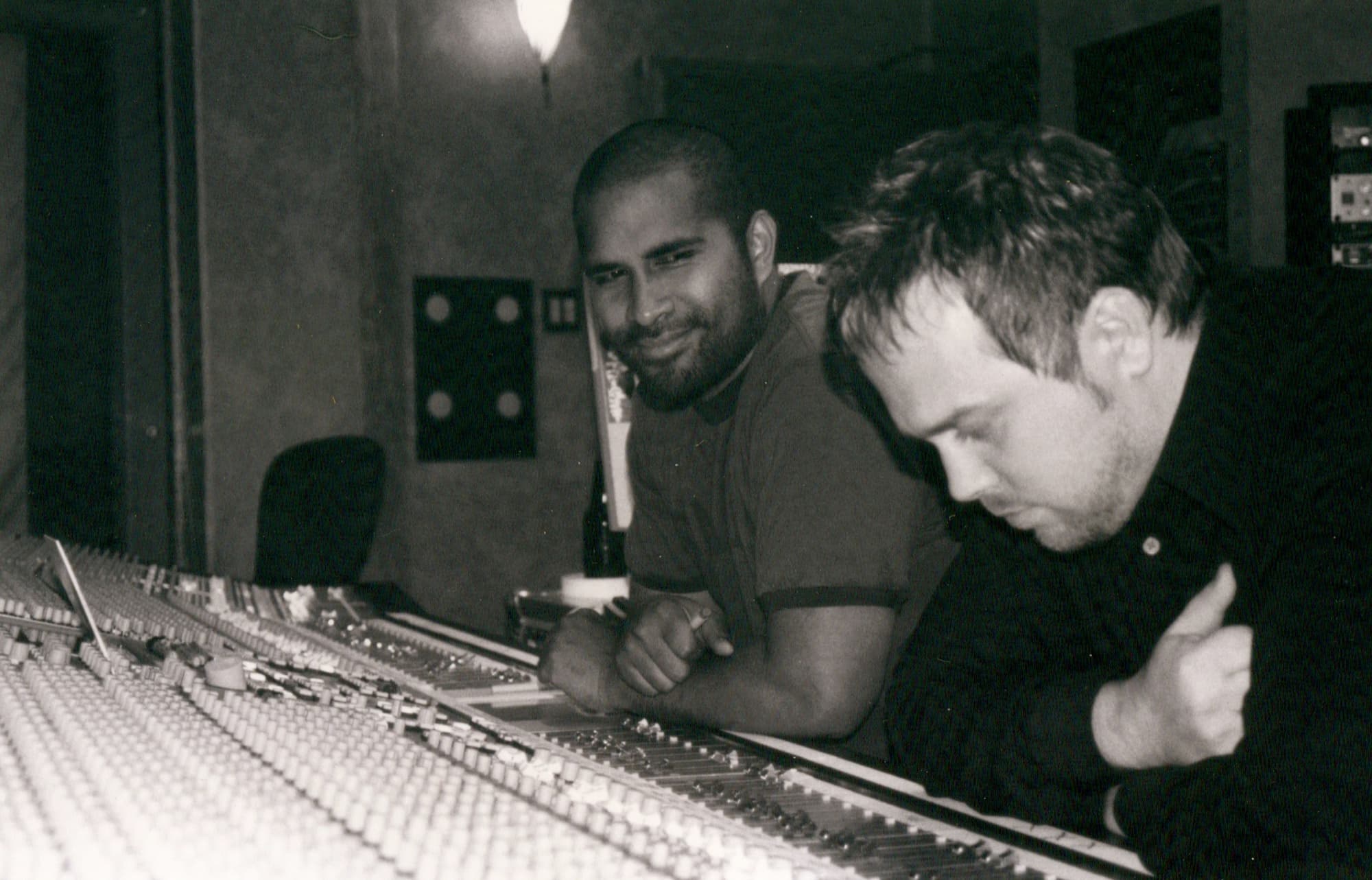 Two people working at a recording console during the Katinas period