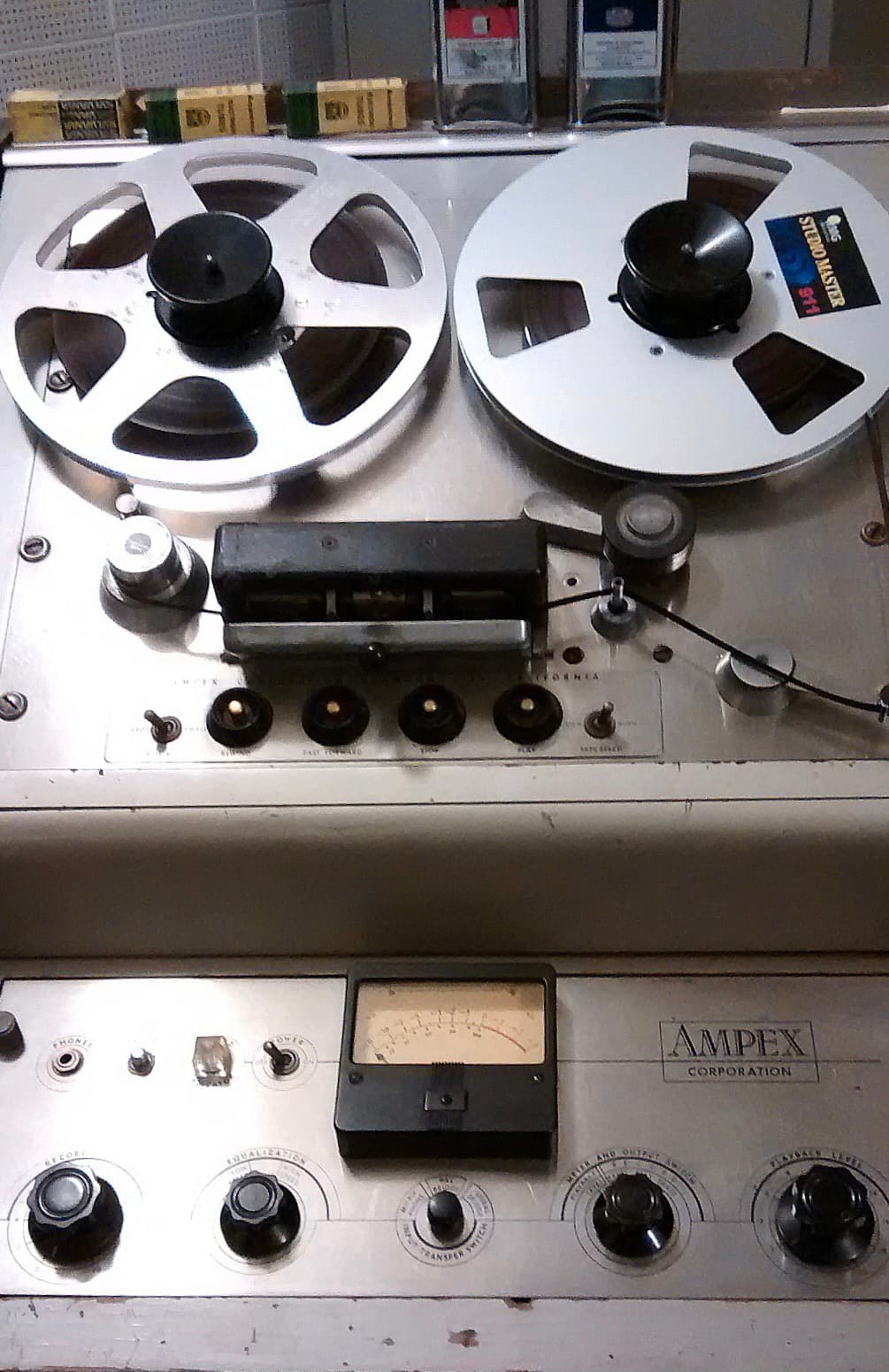 Close detail of an Ampex reel-to-reel tape transport