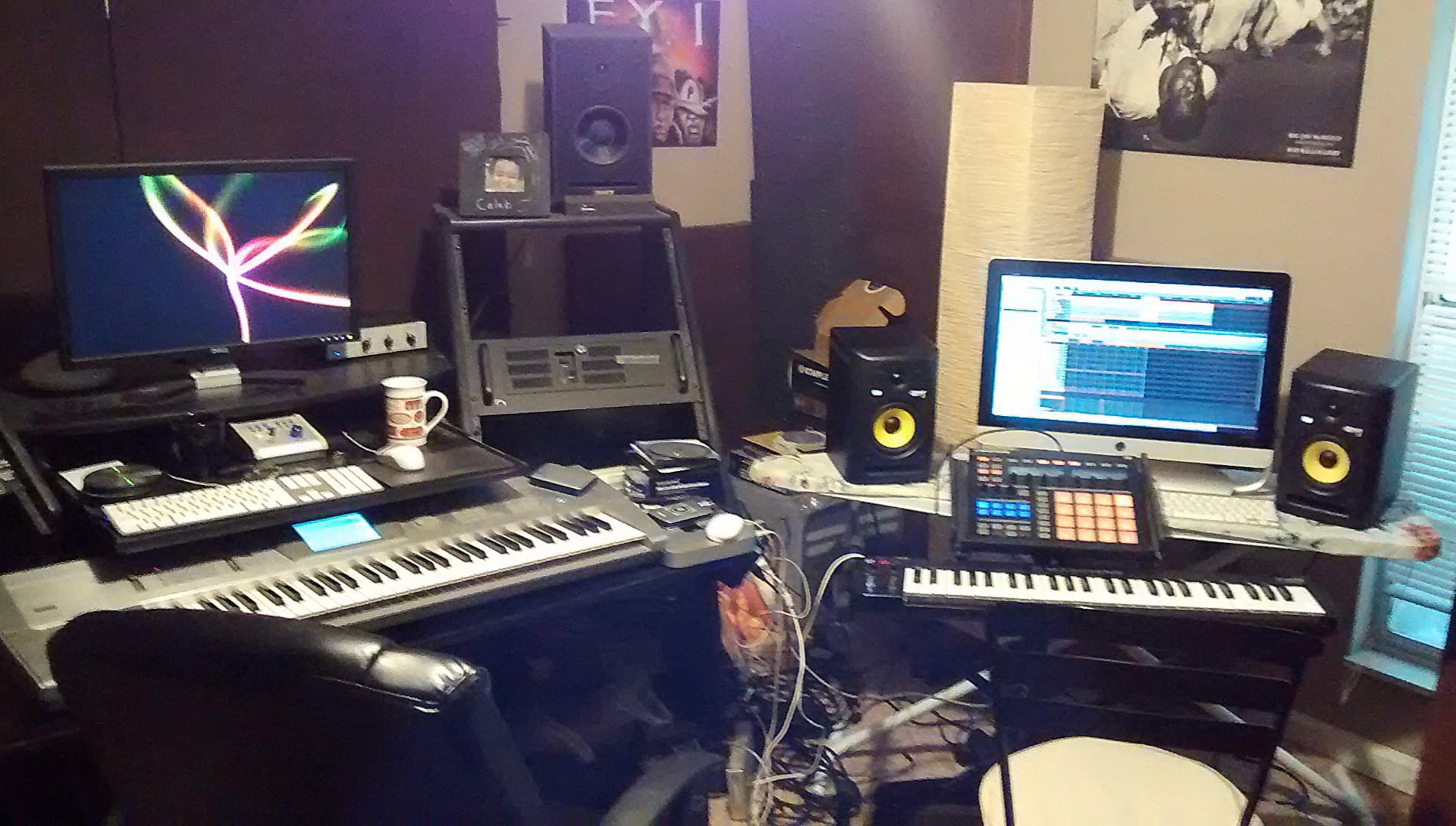 Earlier Ghostown production setup with keyboards, displays, pads, and acoustic treatment