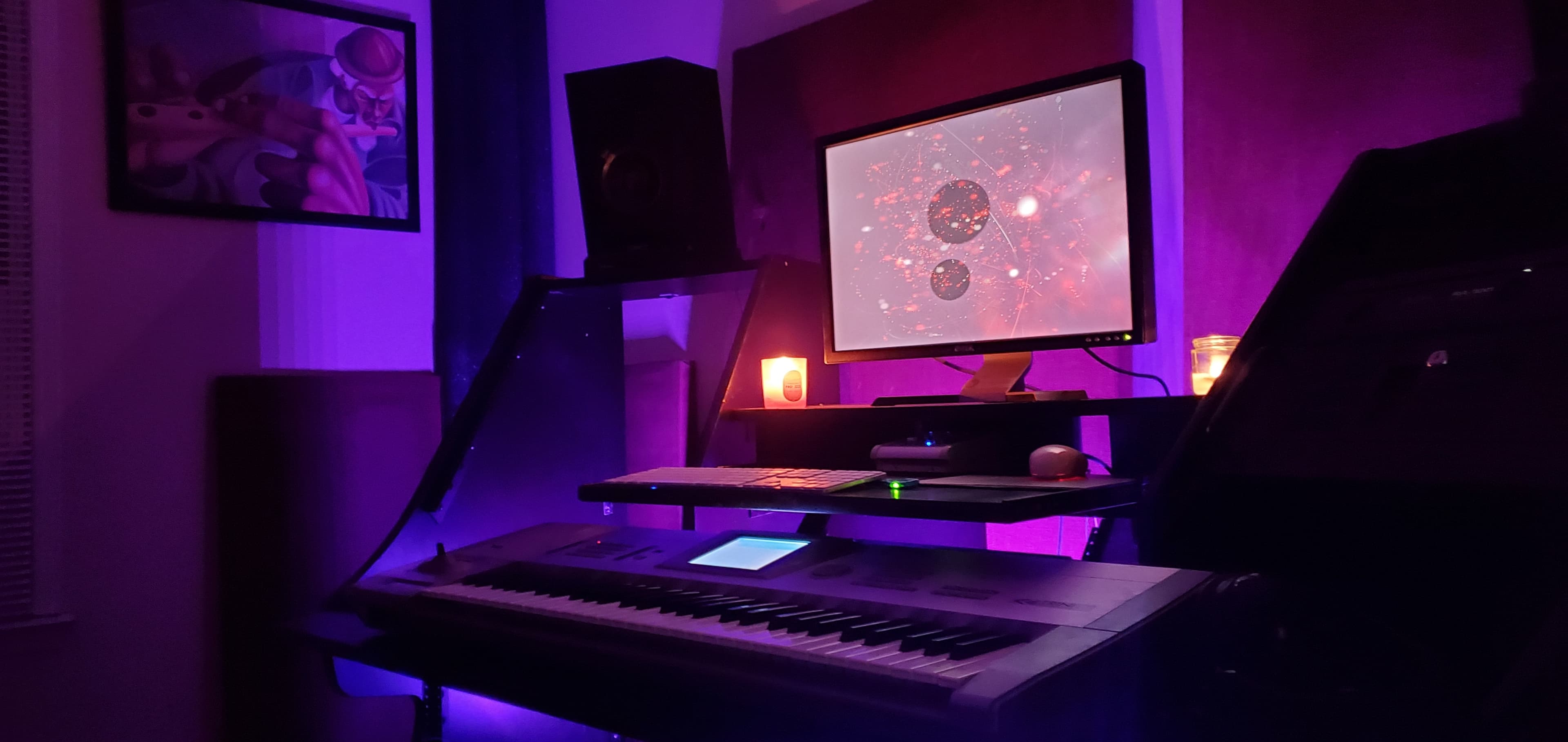 Side view of the current Ghostown Studios workstation, keyboard, and monitors